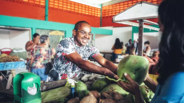 Produce seller at farmers market