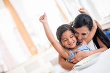 Mother and daughter eating